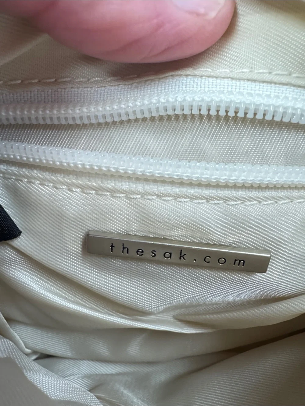 The Sak Cream Woven Zip Clutch
